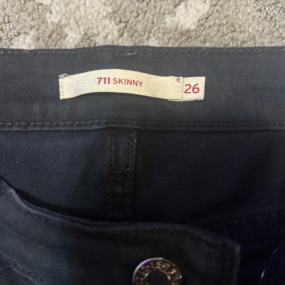 Levi black skinny jeans